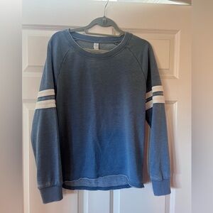 Faded blue sweatshirt with stripe sleeve